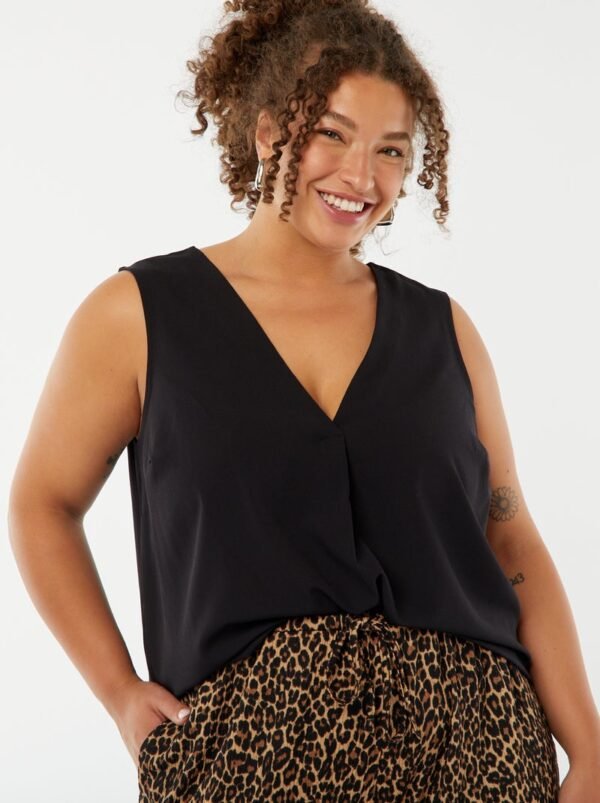 بلوزة Blusa lisa con costura