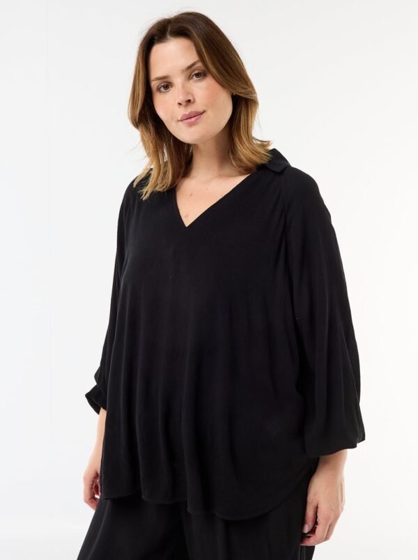 بلوزة Blusa de pico suelto